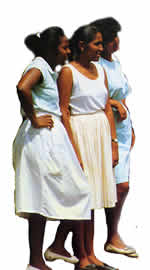 Three women standing in profile